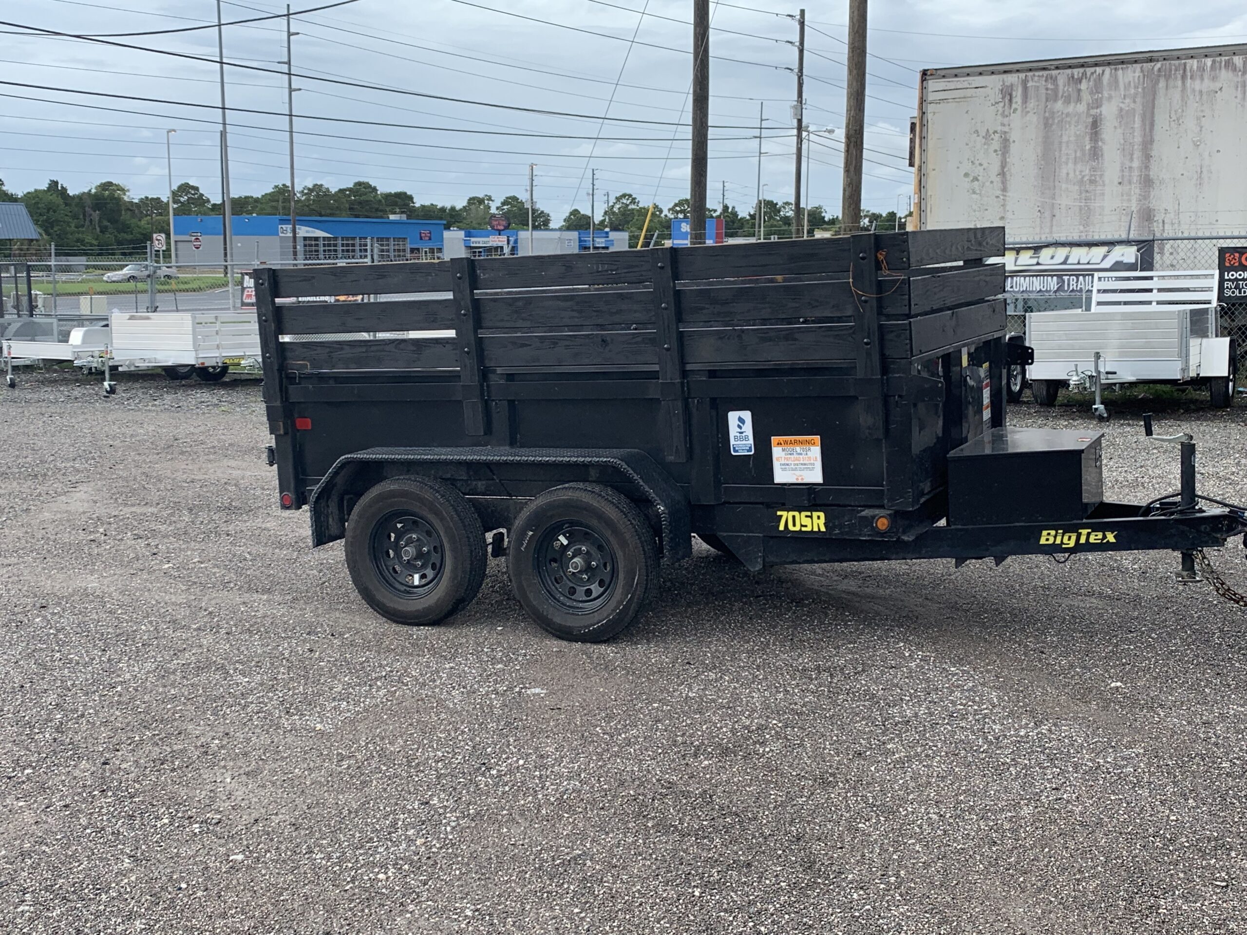 Empty Junk Busters dump trailer ready for a Tampa Bay cleanup or debris project